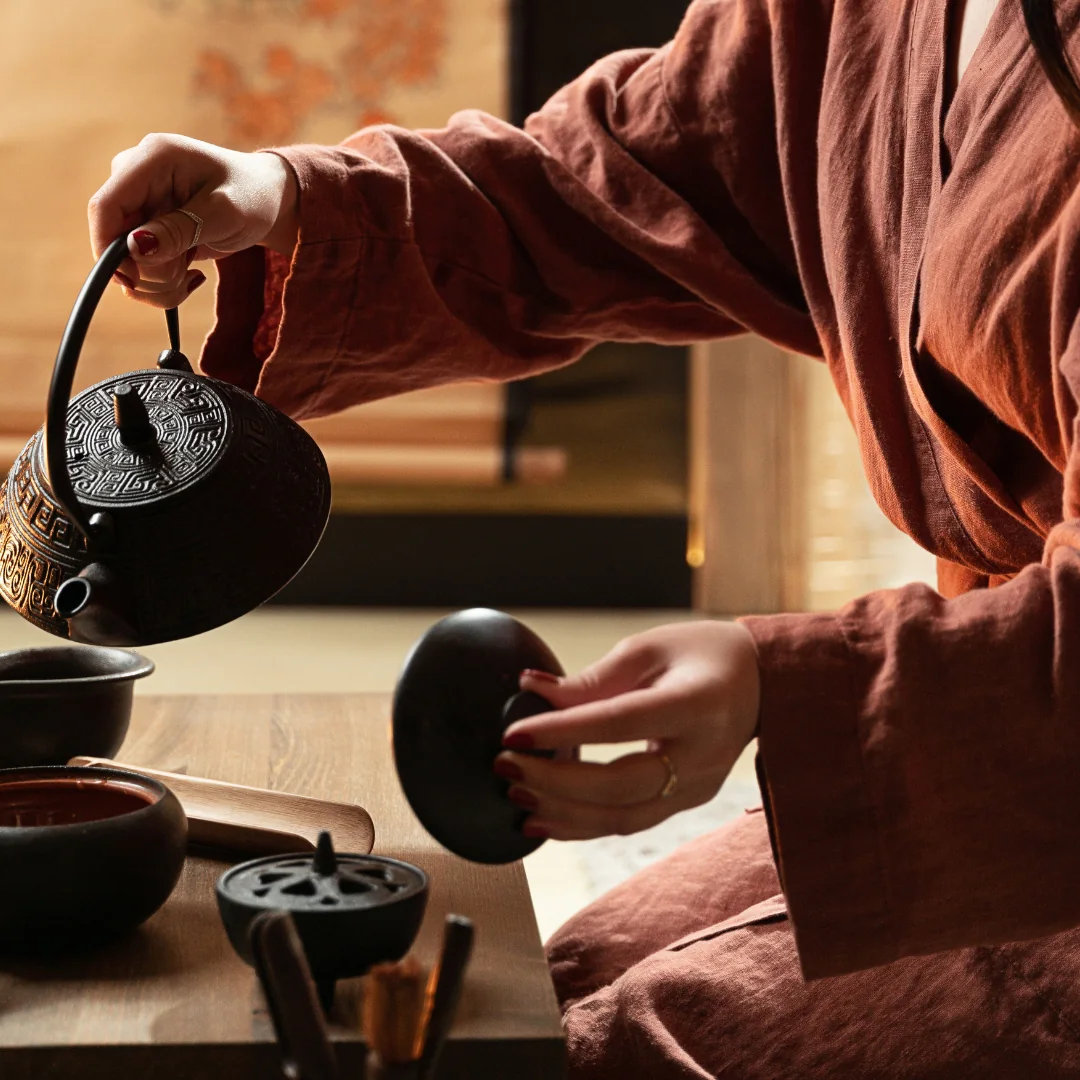 Tea offered during a Wax On Wax Off ritual